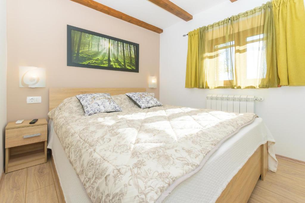 Postel nebo postele na pokoji v ubytování Spacious holiday home Guran