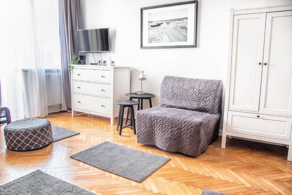 Posezení v ubytování AL-DOM apartamenty Apartament Stary Park
