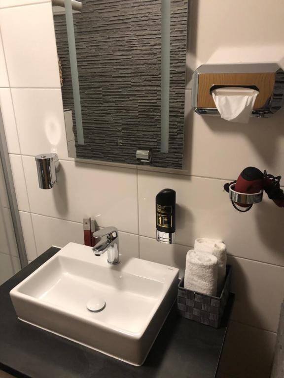 Koupelna v ubytování Hotel am Brünnchen