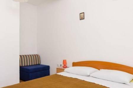 Postel nebo postele na pokoji v ubytování Apartments Felix