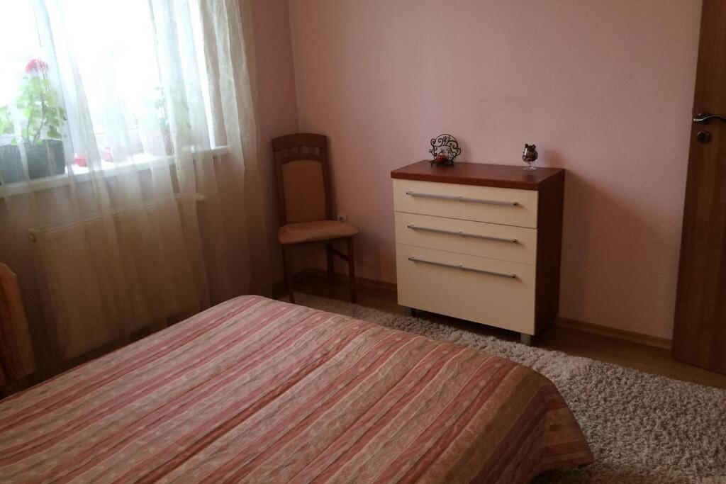 Postel nebo postele na pokoji v ubytování Apartments in a private house