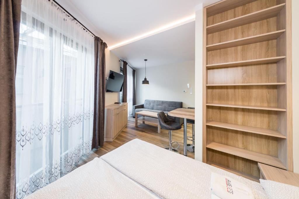 Posteľ alebo postele v izbe v ubytovaní Deluxe Apartment Rakowicka 15 WAWELOFTS