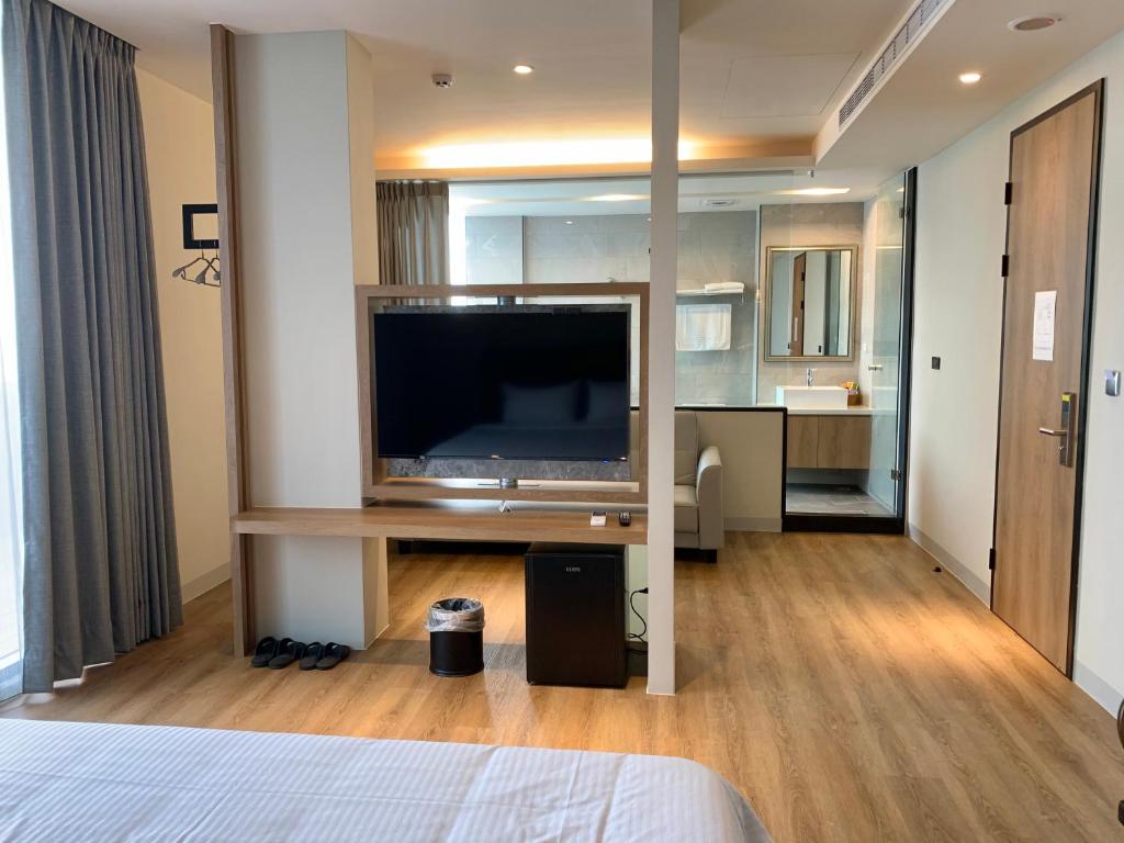 TV a/nebo společenská místnost v ubytování Dream Summer Hotel