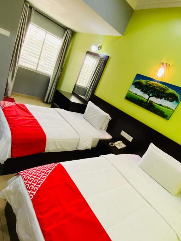 Postel nebo postele na pokoji v ubytování Ct Hotel