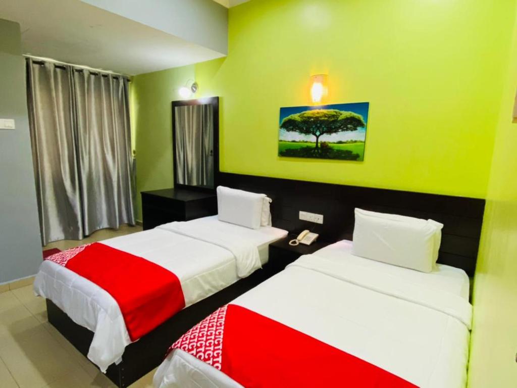 Postel nebo postele na pokoji v ubytování Ct Hotel