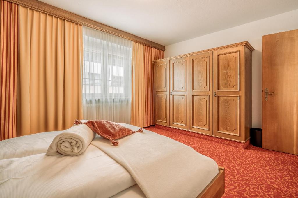 Postel nebo postele na pokoji v ubytování Fortuna Apart Hotel B&B
