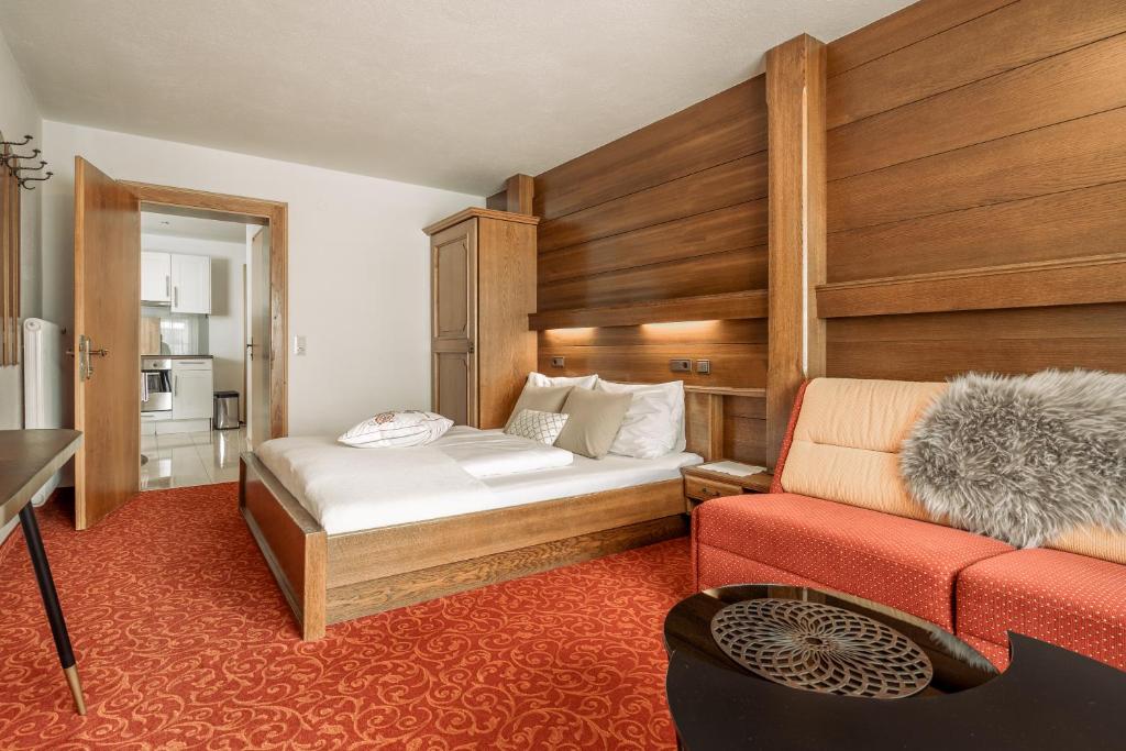 Postel nebo postele na pokoji v ubytování Fortuna Apart Hotel B&B