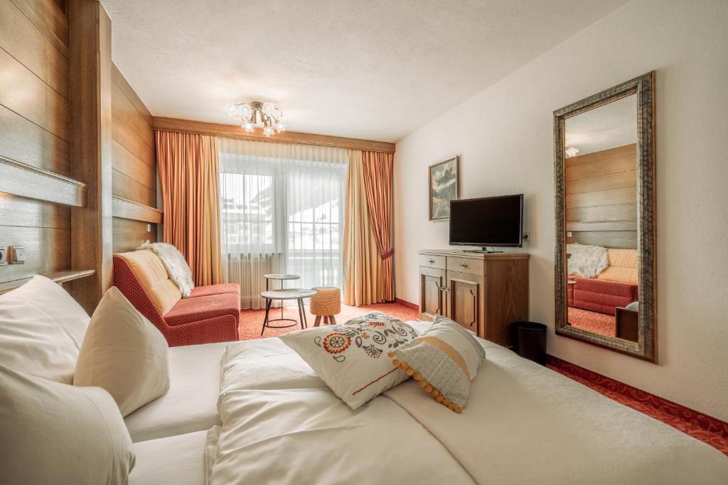 Postel nebo postele na pokoji v ubytování Fortuna Apart Hotel B&B