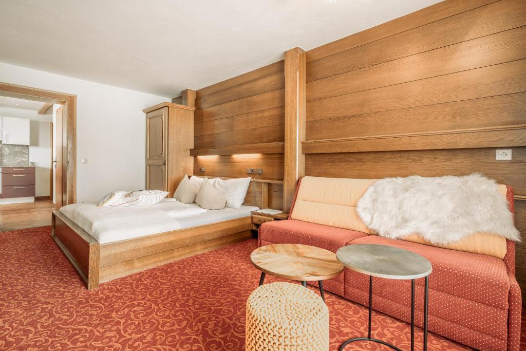 Postel nebo postele na pokoji v ubytování Fortuna Apart Hotel B&B