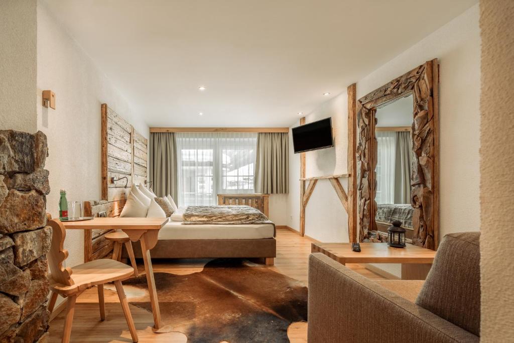 Postel nebo postele na pokoji v ubytování Fortuna Apart Hotel B&B