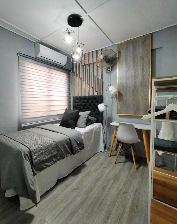 Postel nebo postele na pokoji v ubytování Maya Homestay Putrajaya @ Twelve