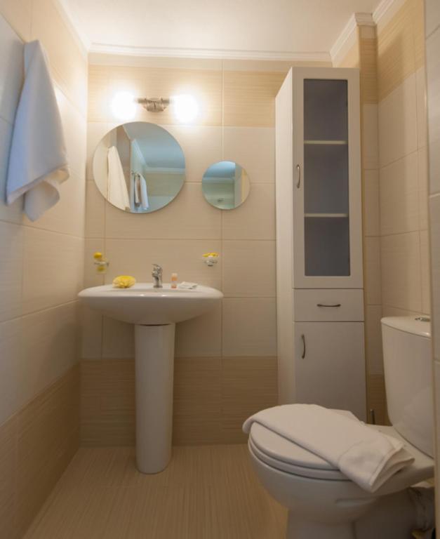 A bathroom at Peonia and Ortansia Villas - Few Steps from the beach