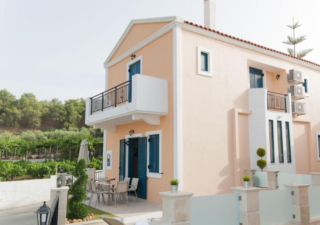 A balcony or terrace at Peonia and Ortansia Villas - Few Steps from the beach