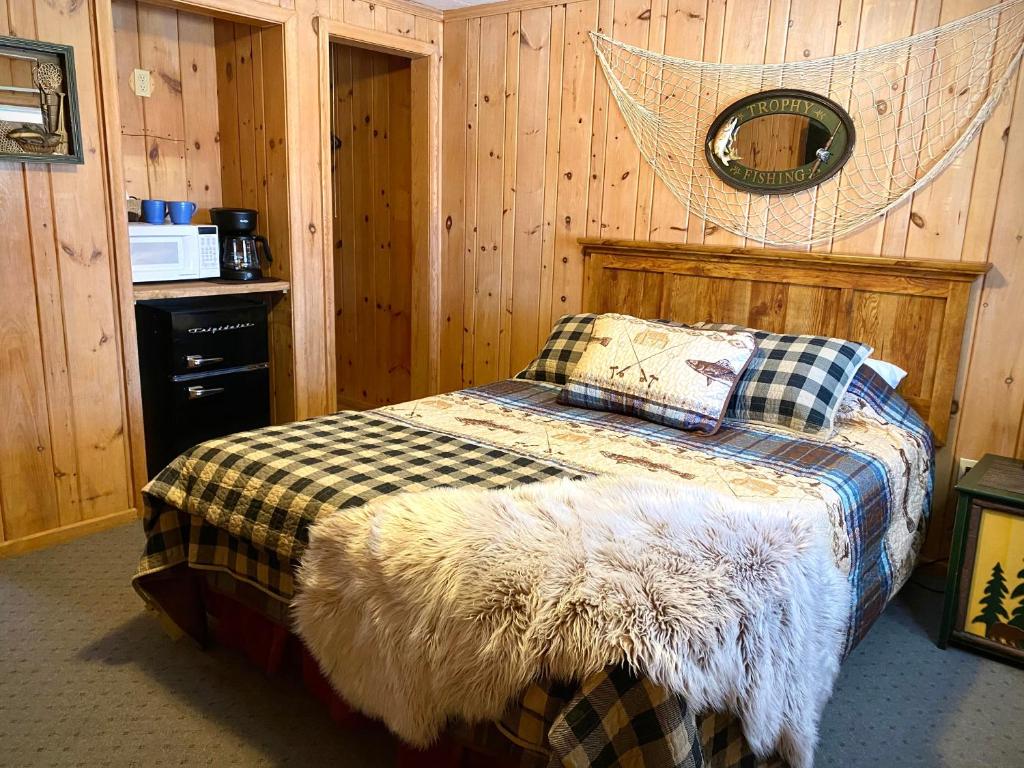 Postel nebo postele na pokoji v ubytování Moosewood Inn