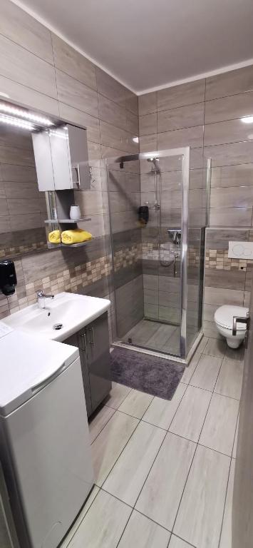 A bathroom at Sweet&Center Wellness apartman