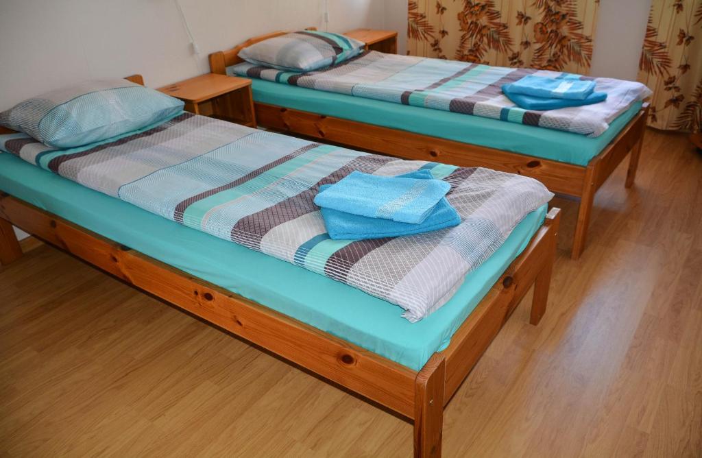 A bed or beds in a room at Haanja Guest Apartment with Sauna