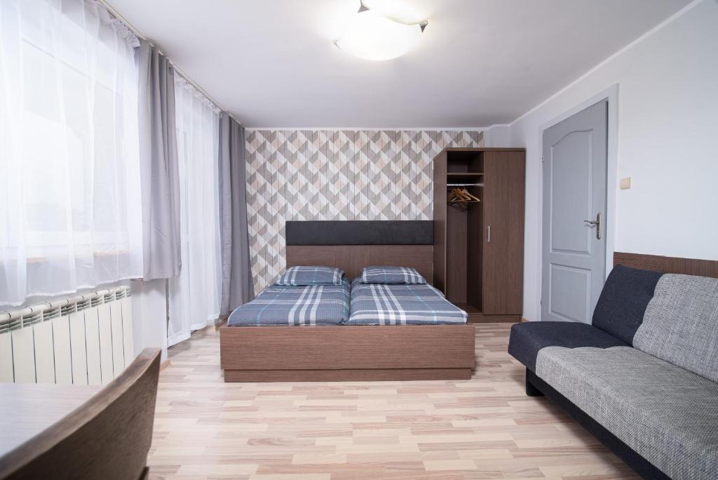 Cama o camas de una habitación en Super Pokoje Tom