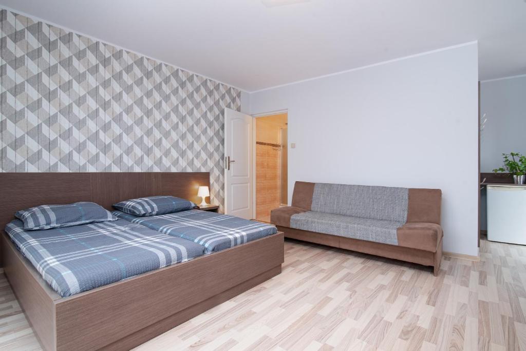 Cama o camas de una habitación en Super Pokoje Tom