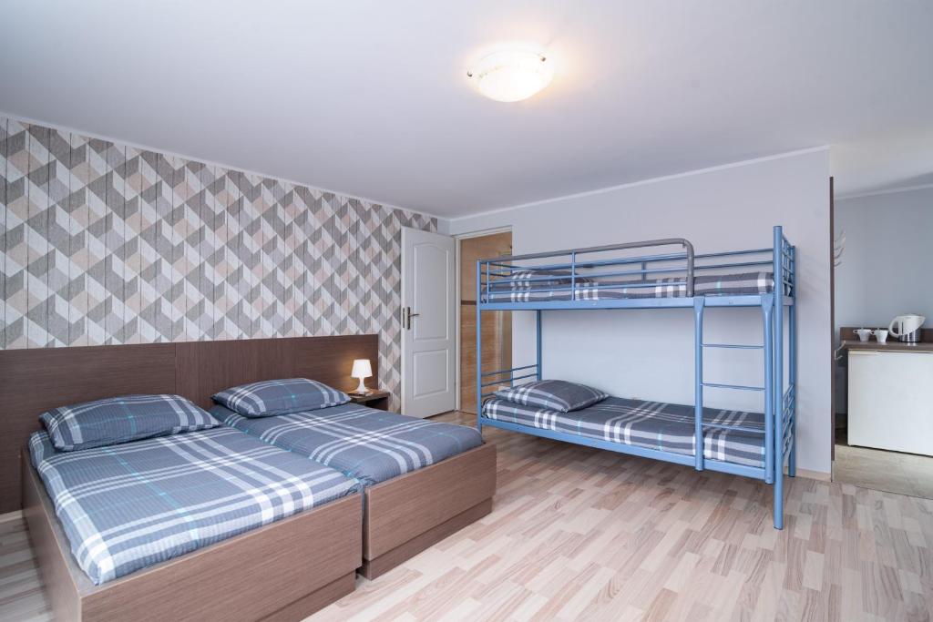 Cama o camas de una habitación en Super Pokoje Tom
