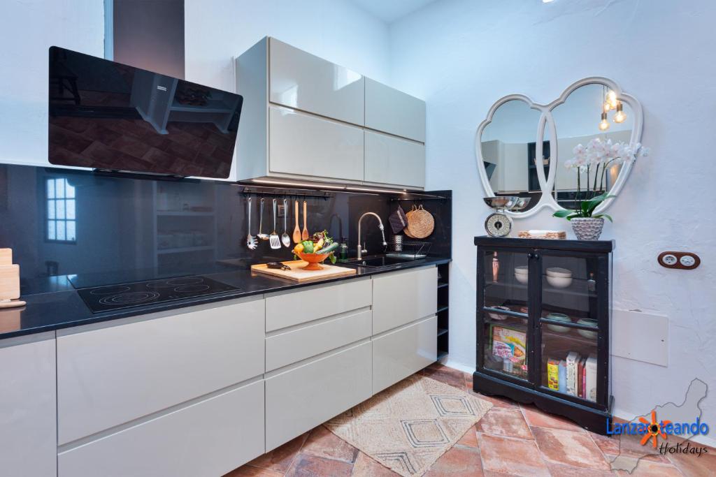 Kuchyň nebo kuchyňský kout v ubytování Vivienda Vacacional El Patio de Franky