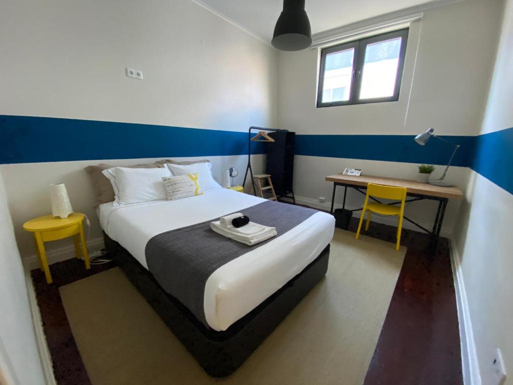 Postel nebo postele na pokoji v ubytování Procyon Boutique & Suites