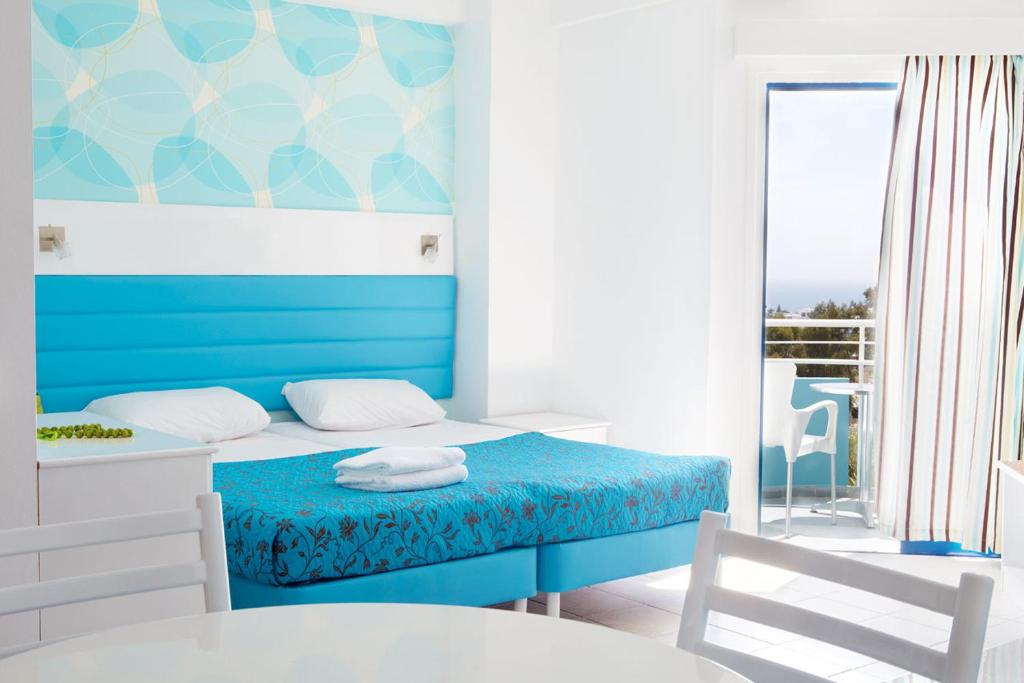 Postel nebo postele na pokoji v ubytování Lantiana Gardens ApartHotel