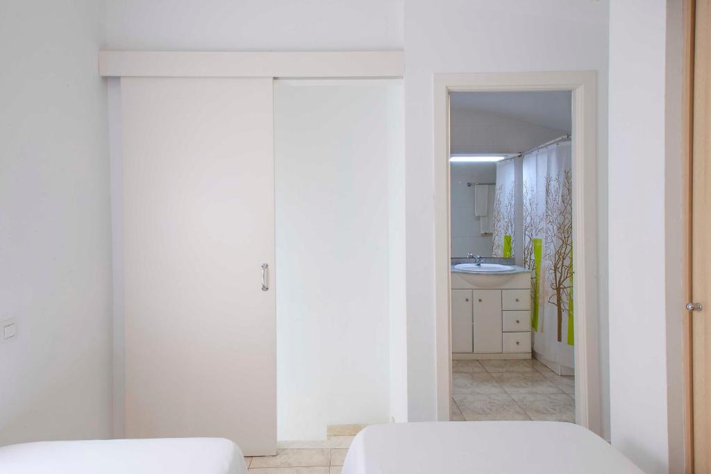 Posteľ alebo postele v izbe v ubytovaní Apartaments La Torreta
