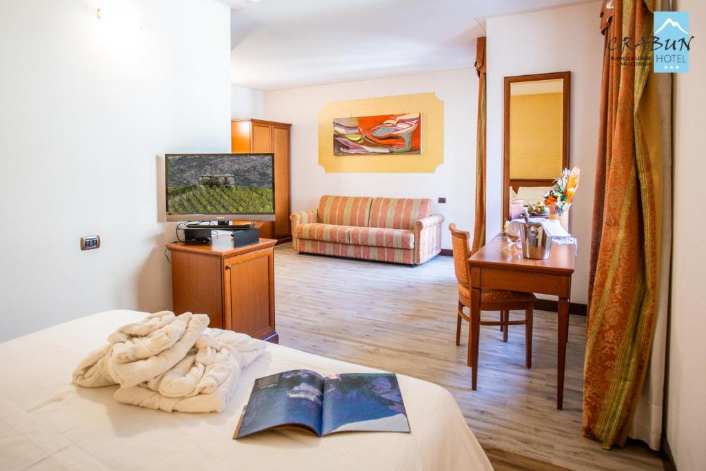 Postel nebo postele na pokoji v ubytování Crabun Hotel