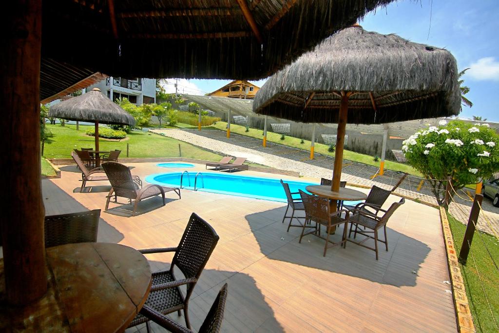 Swimmingpoolen hos eller tæt på Apart Hotel Litoral Sul