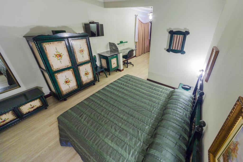 Postel nebo postele na pokoji v ubytování Hotel Tannenhof
