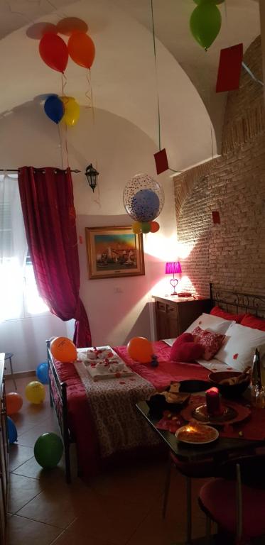 A bed or beds in a room at Cà de Matagè