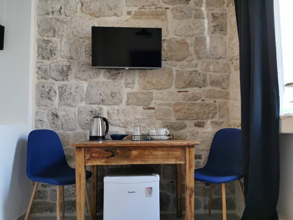 TV a/nebo společenská místnost v ubytování House Bava