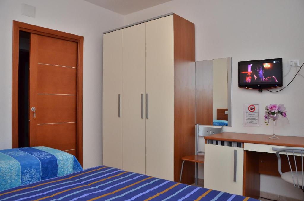 Postel nebo postele na pokoji v ubytování Domo - Guest-House Il Nespolo Fiorito