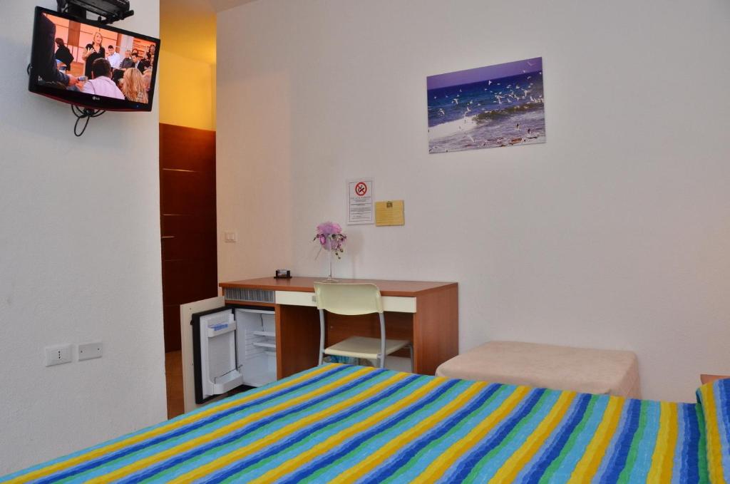TV a/nebo společenská místnost v ubytování Domo - Guest-House Il Nespolo Fiorito