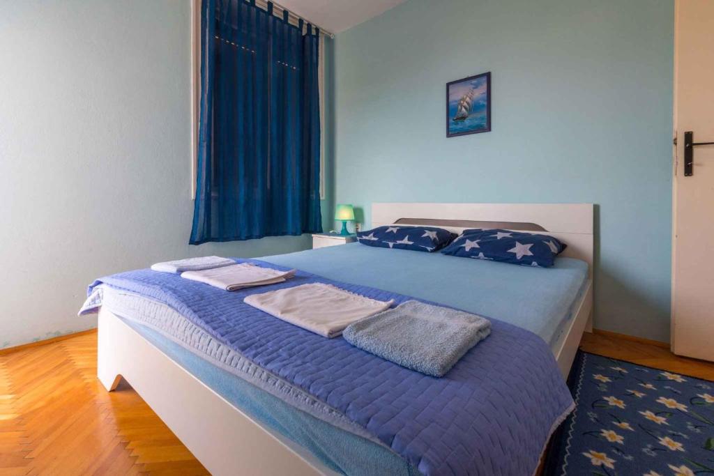 Posteľ alebo postele v izbe v ubytovaní Apartment in Crikvenica 5611