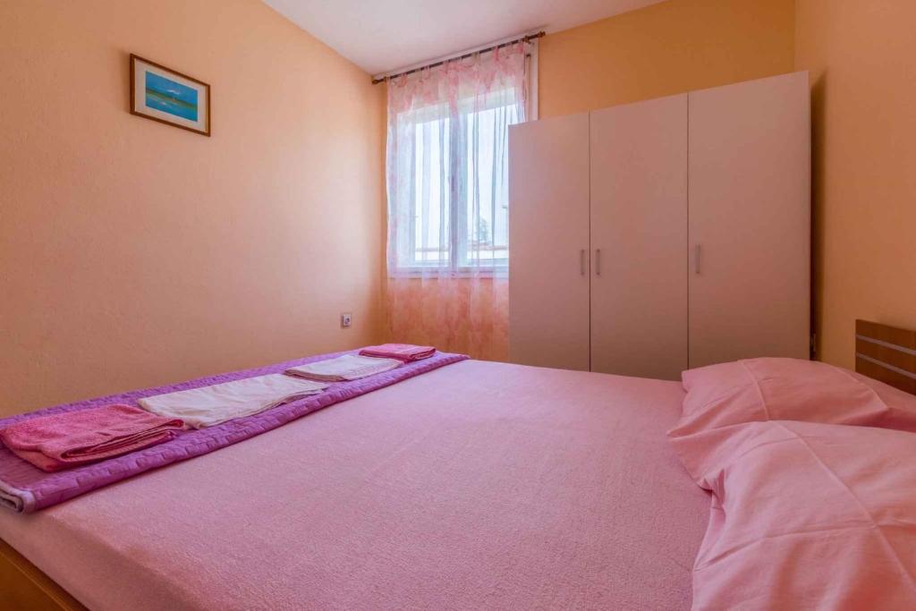 Posteľ alebo postele v izbe v ubytovaní Apartment in Crikvenica 5611