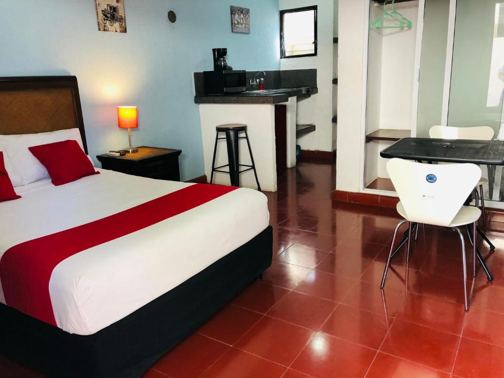 Llit o llits en una habitació de Hotel Dpas 52
