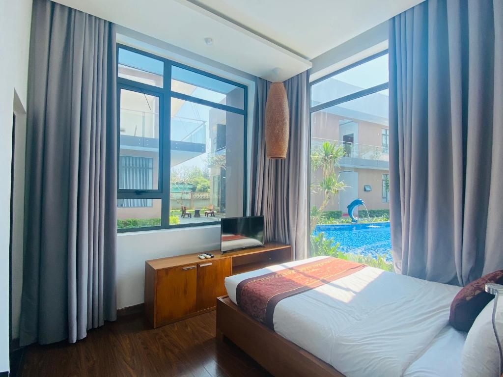Giường trong phòng chung tại Sepon Resort - Cua Viet Beach