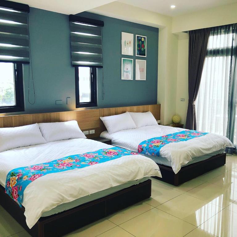 Postel nebo postele na pokoji v ubytování Tung Shiang Homestay