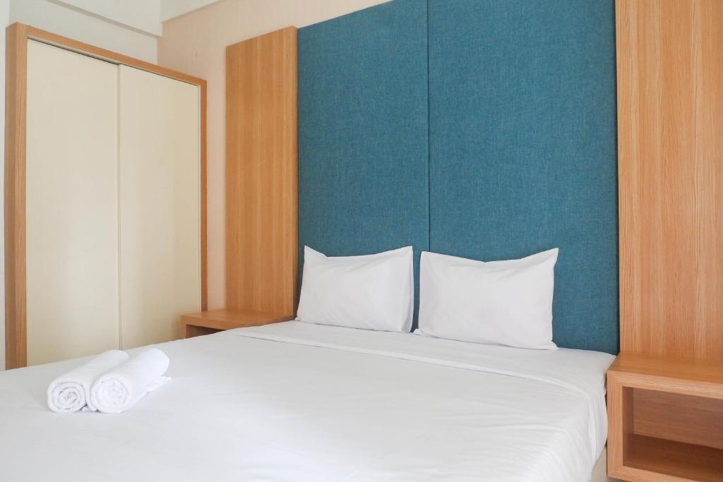 Postel nebo postele na pokoji v ubytování Best Value Studio Room Apartment at Pavilion Permata By Travelio