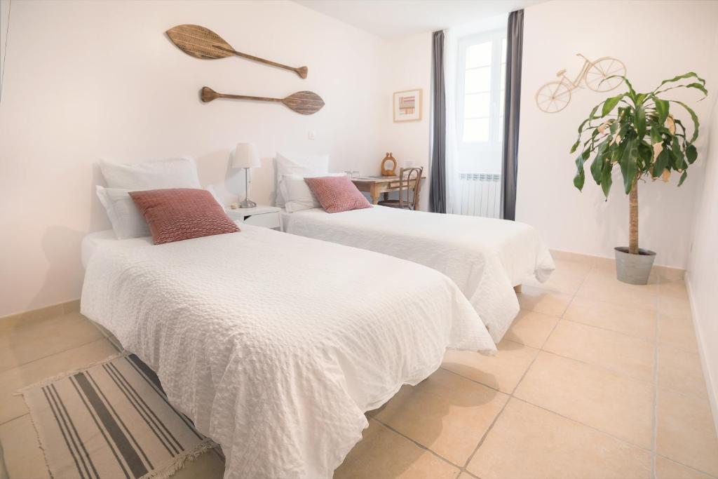 Postel nebo postele na pokoji v ubytování H2o Chambres d'Hôtes