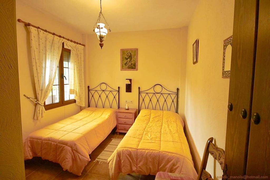 Posteľ alebo postele v izbe v ubytovaní Charming Villa in Ronda with Pool