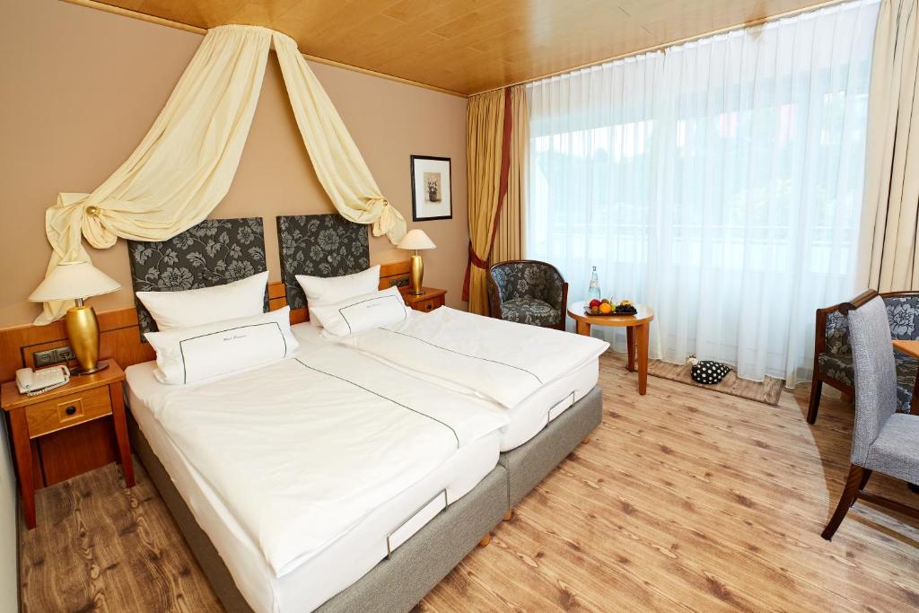 Postel nebo postele na pokoji v ubytování Hotel Panorama