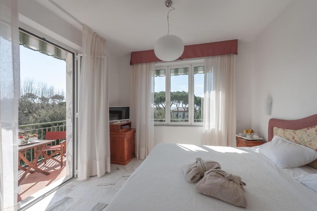 Postel nebo postele na pokoji v ubytování President Hotel