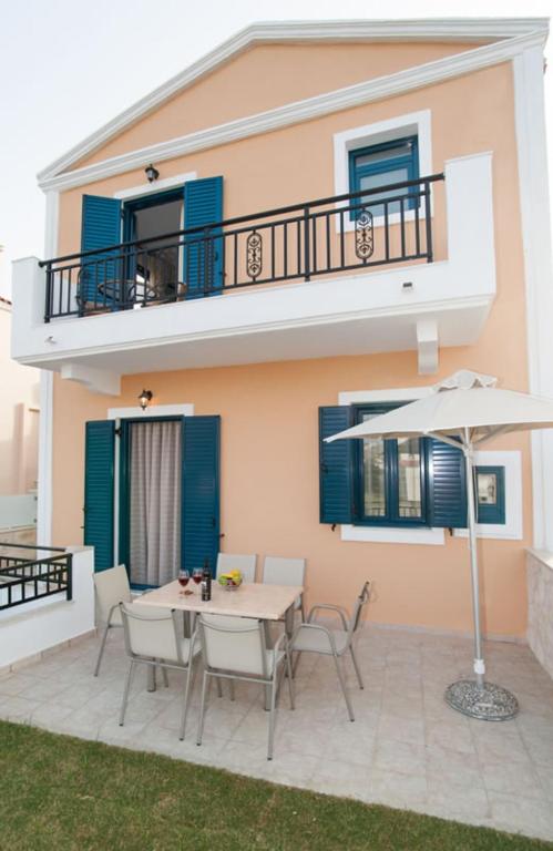 A balcony or terrace at Peonia and Ortansia Villas - Few Steps from the beach