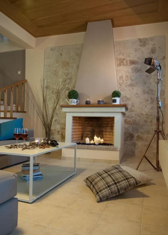 A seating area at Peonia and Ortansia Villas - Few Steps from the beach