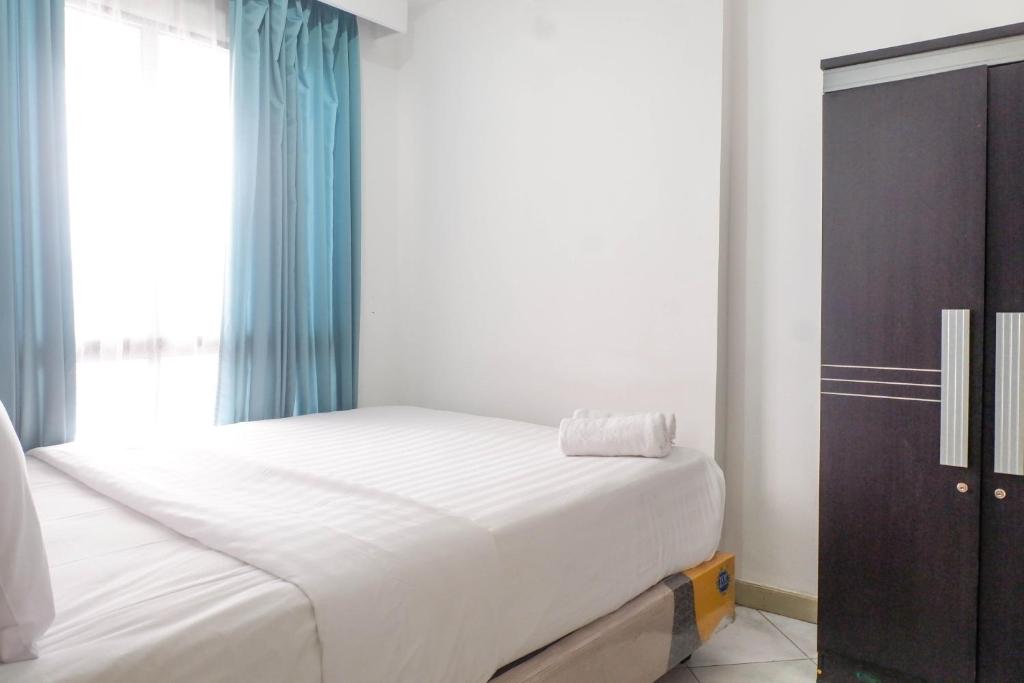 Spacious Classic 1BR Apartment at Taman Beverly By Travelio - One-Bedroom Apartment