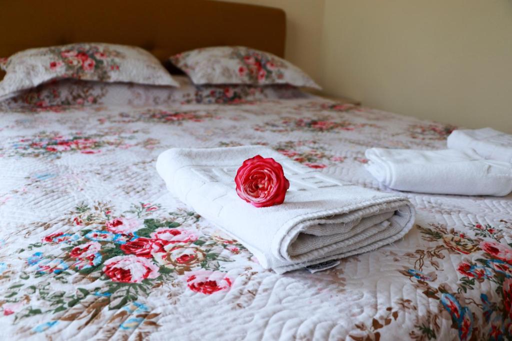Postel nebo postele na pokoji v ubytování Hotel Florentina