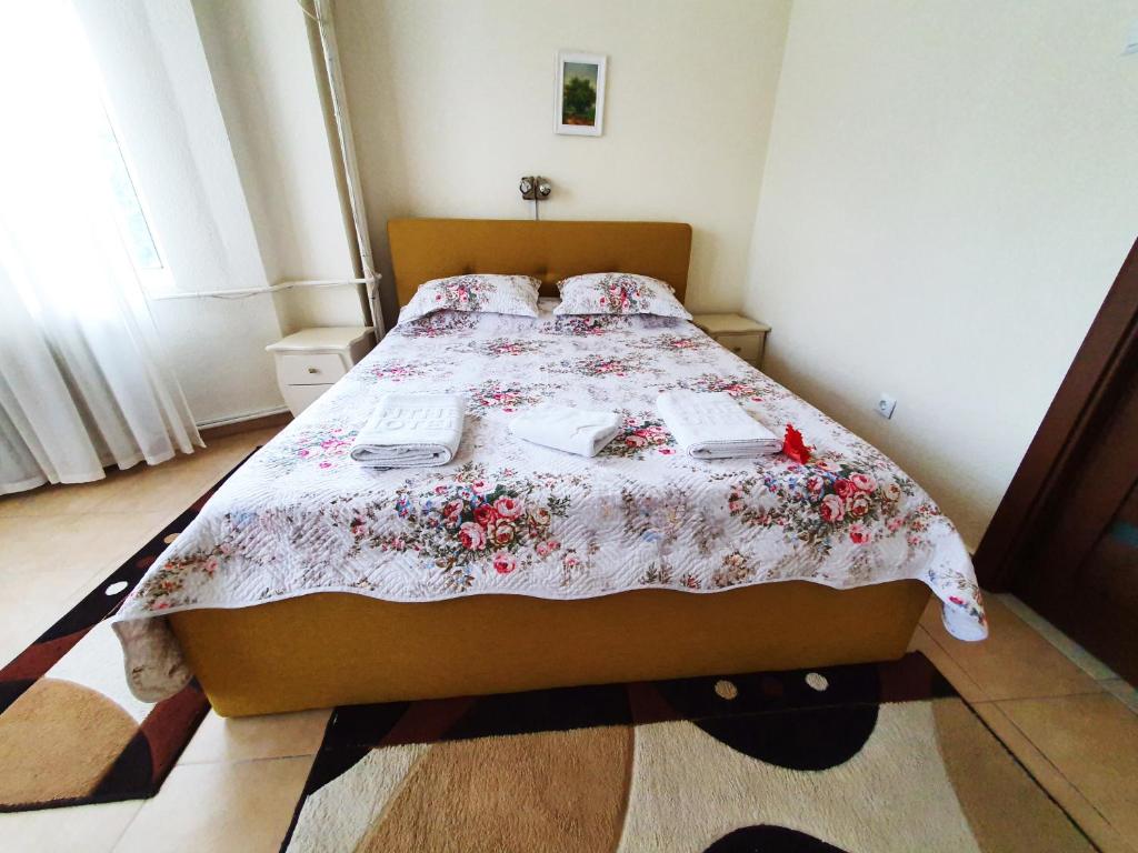 Postel nebo postele na pokoji v ubytování Hotel Florentina