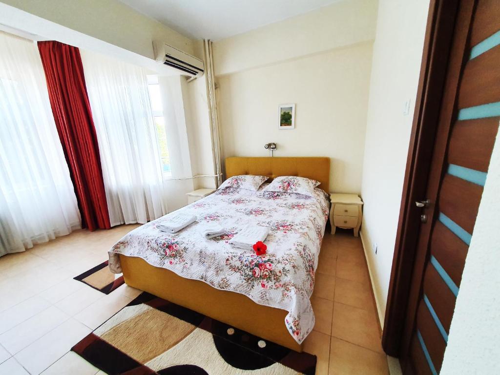 Postel nebo postele na pokoji v ubytování Hotel Florentina